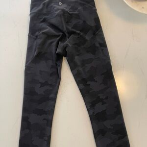Lululemon Black Camo Leggings Size 6/8
unsure of style